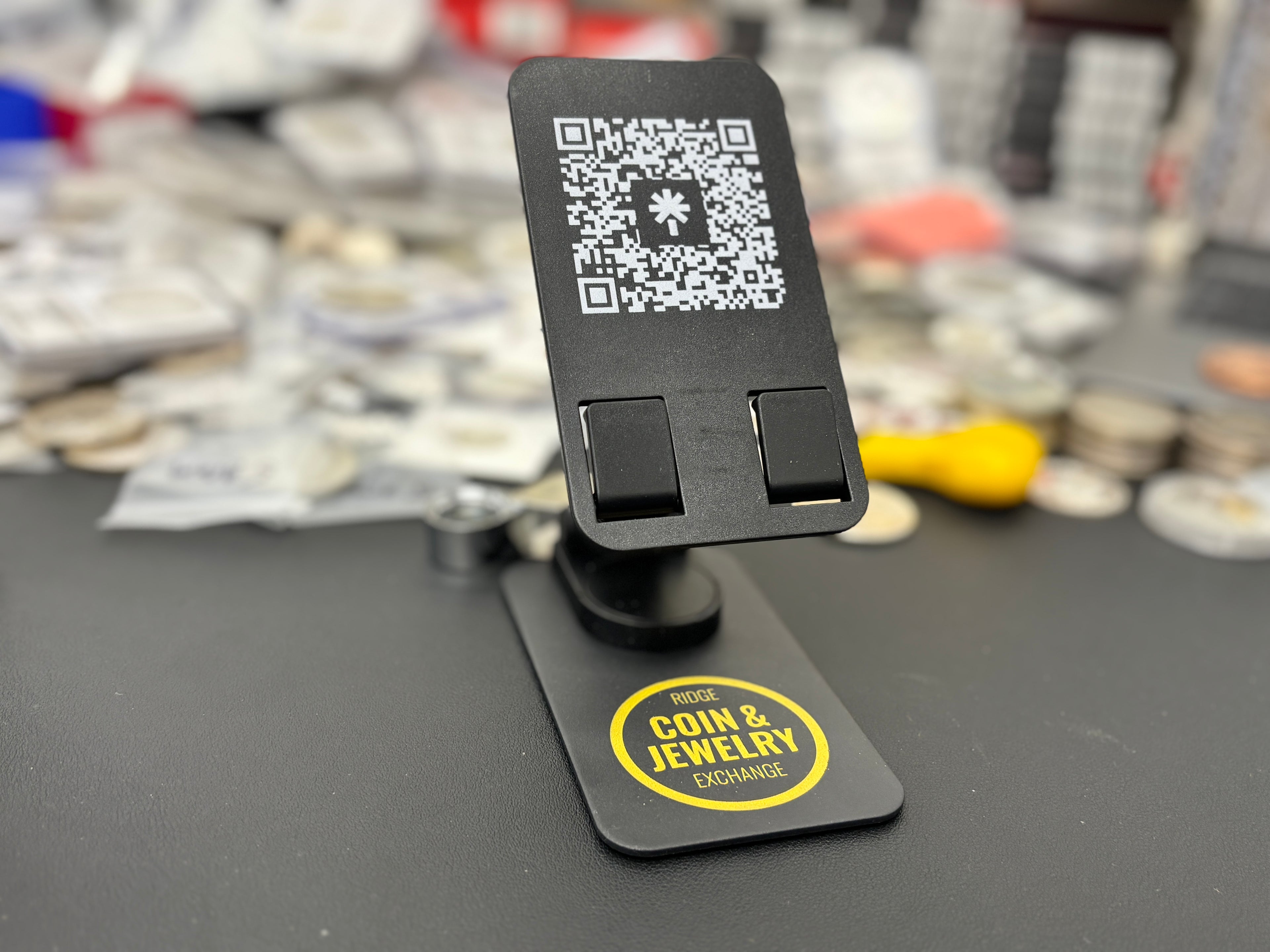 Ridge Coin & Jewelry Exchange Live Stream QR Phone Stand